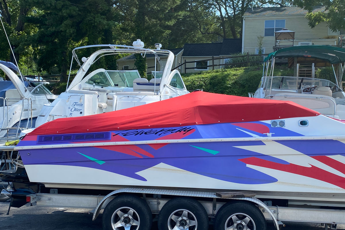 Red cockpit cover on a trailered powerboat